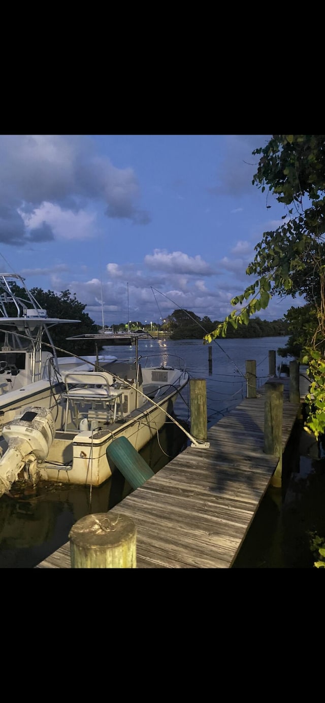 view of dock with a water view