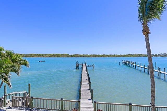 dock area featuring a water view