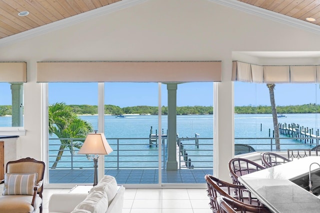 sunroom / solarium with vaulted ceiling, wooden ceiling, and a water view