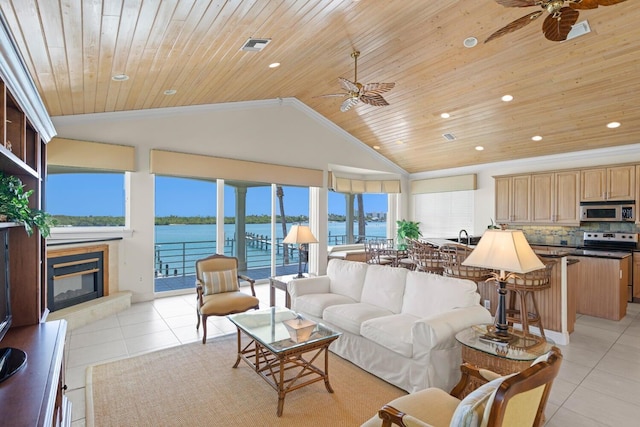 tiled living room featuring vaulted ceiling, a water view, wooden ceiling, and ceiling fan