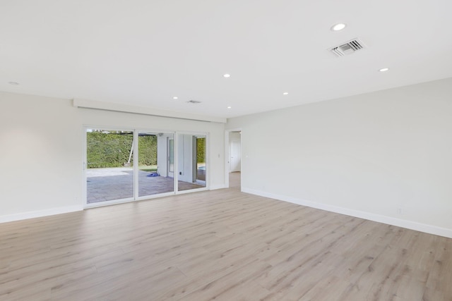 empty room with light wood-type flooring