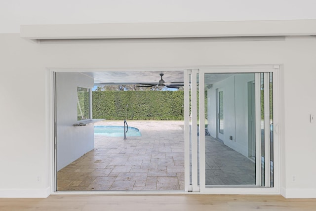 entryway featuring hardwood / wood-style floors and ceiling fan