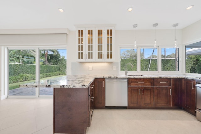 kitchen with dishwasher, sink, backsplash, kitchen peninsula, and white cabinets