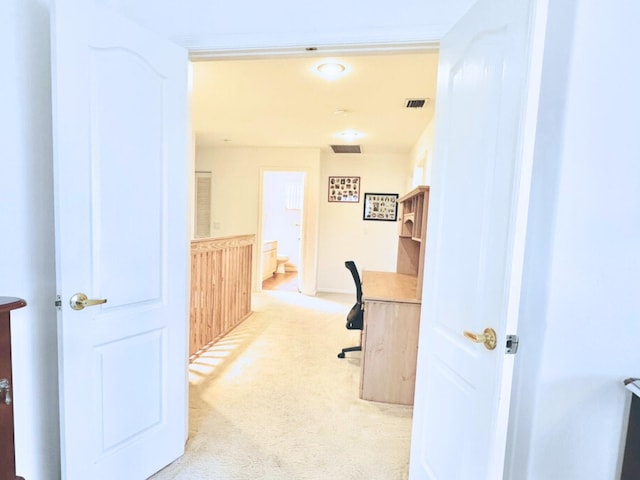 office area with light colored carpet