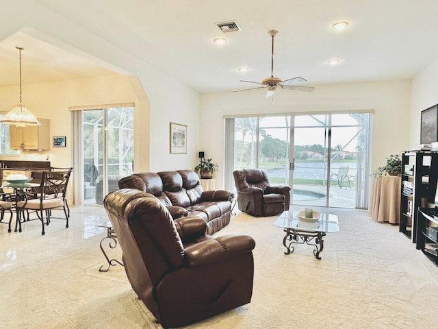 living room with ceiling fan