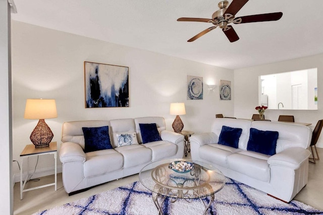 living room with ceiling fan