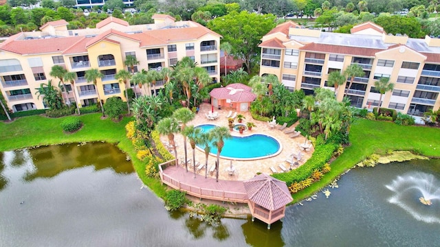 birds eye view of property featuring a water view