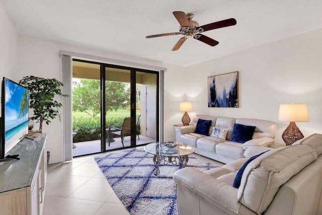 tiled living room featuring ceiling fan