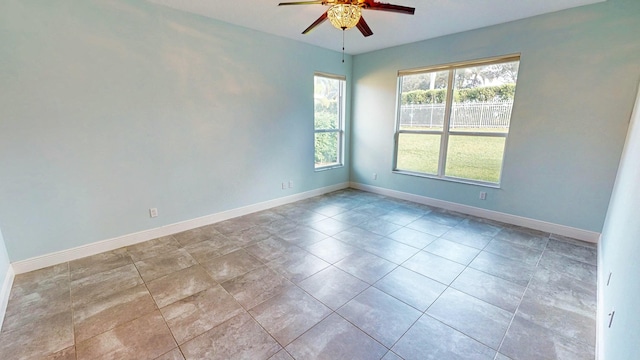 empty room featuring ceiling fan