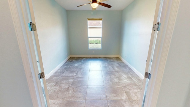 unfurnished room featuring ceiling fan