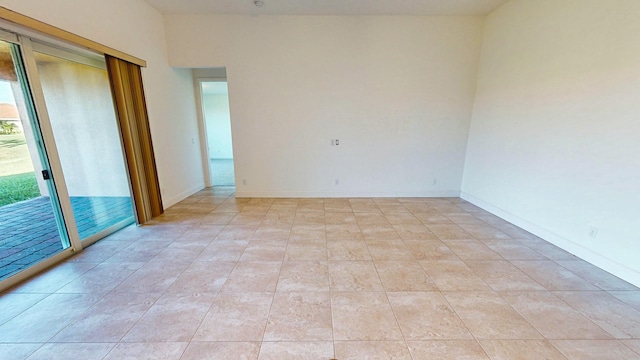 view of tiled spare room