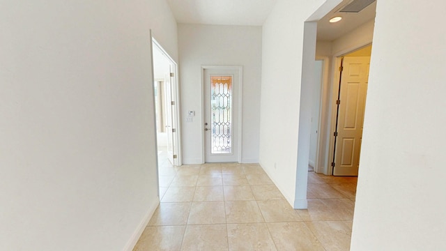 interior space with light tile patterned floors