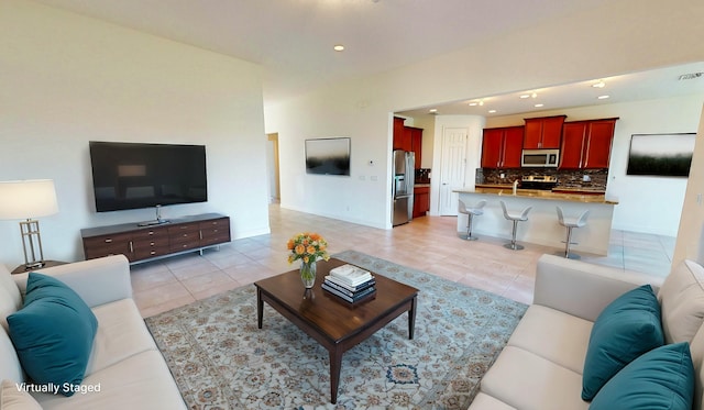 living room featuring light tile patterned floors