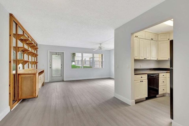 kitchen featuring dishwasher, light hardwood / wood-style floors, a textured ceiling, and ceiling fan