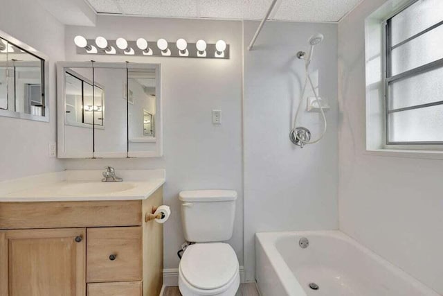 full bathroom with shower / bathing tub combination, vanity, and toilet