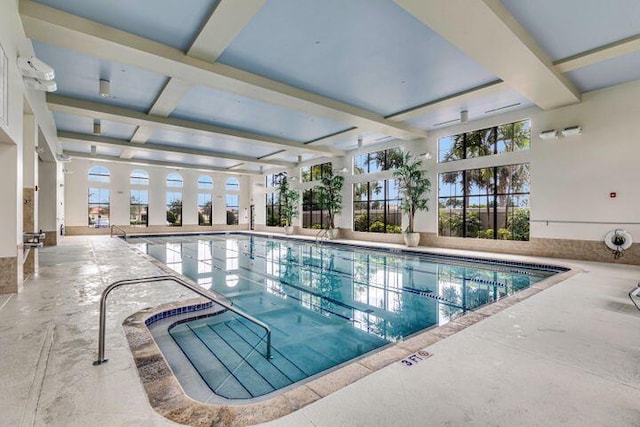 view of swimming pool with a patio area