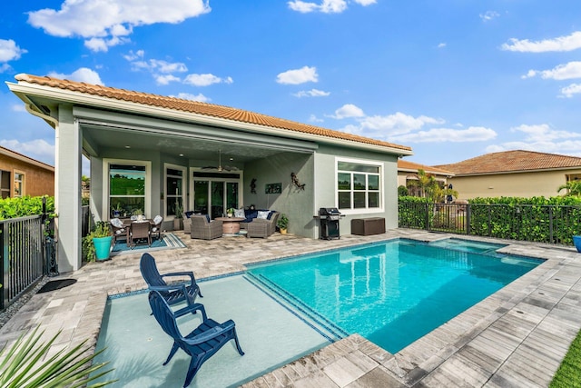 view of pool featuring ceiling fan, a grill, an outdoor living space, and a patio