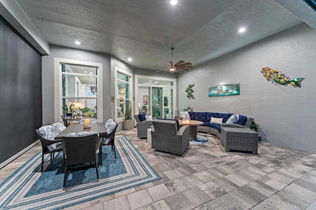 interior space featuring ceiling fan