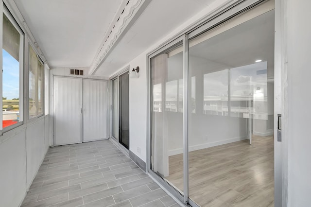 view of unfurnished sunroom