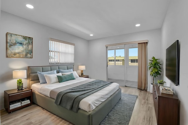 bedroom featuring access to outside, light wood-style flooring, and recessed lighting