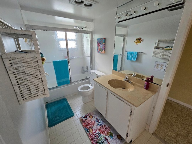 full bathroom with vanity, toilet, and enclosed tub / shower combo