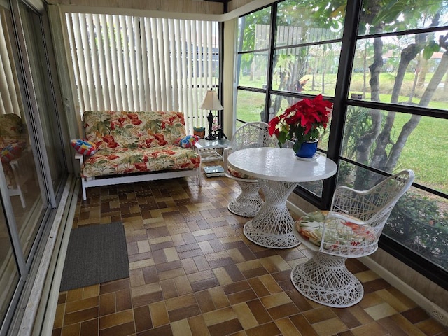 sunroom with plenty of natural light