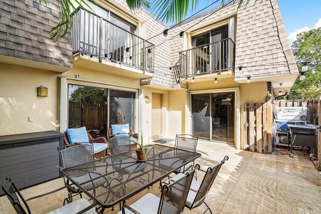 view of patio with a balcony