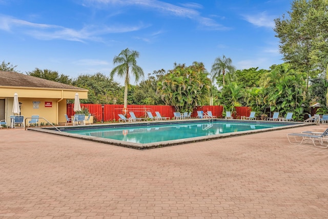 view of swimming pool featuring a patio area