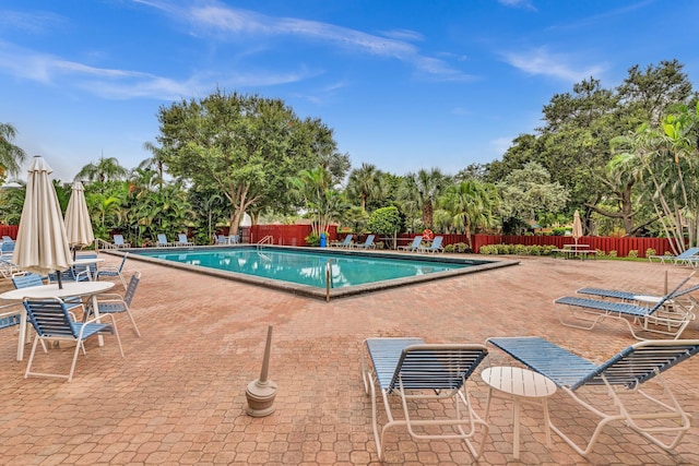 view of swimming pool featuring a patio