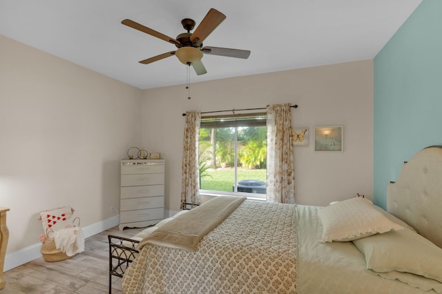 bedroom with ceiling fan and light wood-type flooring