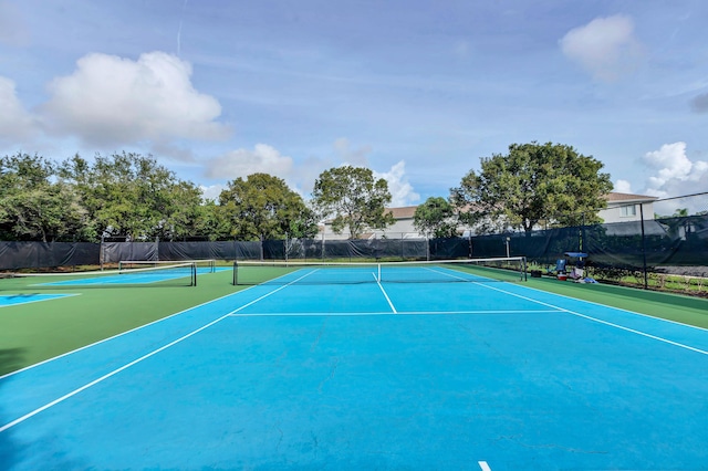 view of tennis court with basketball court