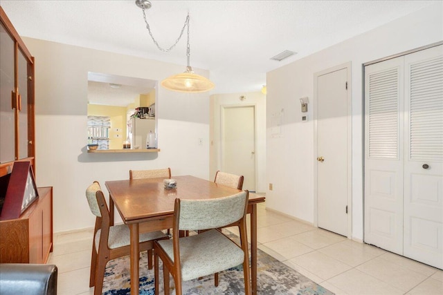 view of tiled dining room