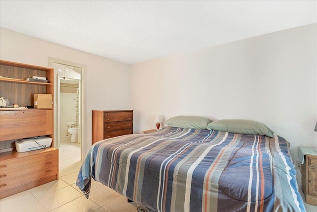 tiled bedroom with ensuite bath