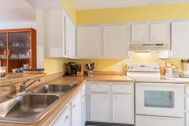 kitchen featuring electric stove, white cabinetry, sink, and a textured ceiling