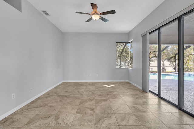 unfurnished room featuring ceiling fan