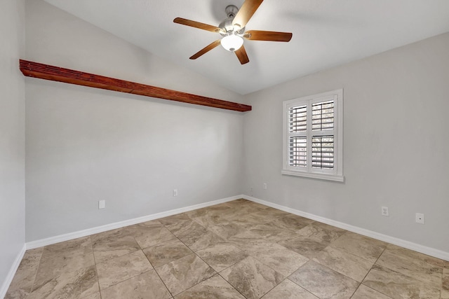 spare room featuring ceiling fan and lofted ceiling