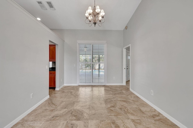 unfurnished room with crown molding and an inviting chandelier