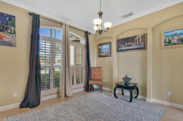 living area with baseboards, visible vents, a chandelier, and crown molding