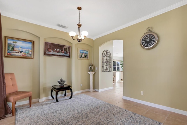 hallway with baseboards, visible vents, crown molding, a notable chandelier, and light tile patterned flooring