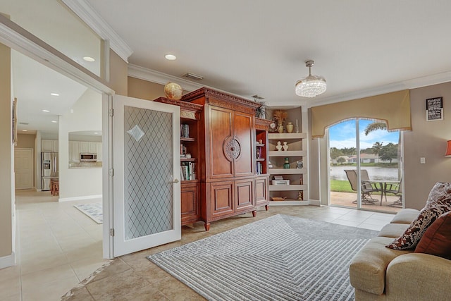 sitting room with recessed lighting, visible vents, crown molding, and light tile patterned floors