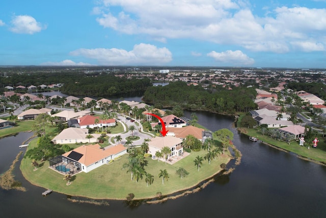 bird's eye view with a residential view and a water view