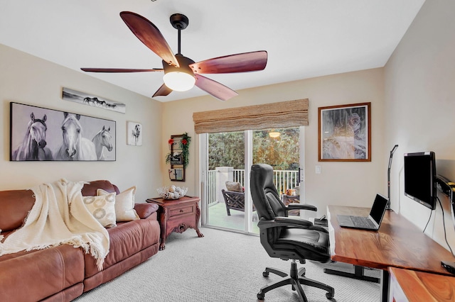 carpeted office with ceiling fan