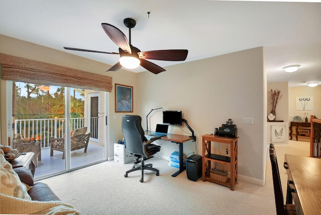 office featuring ceiling fan and light colored carpet