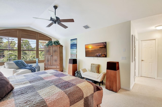 bedroom featuring ceiling fan, light colored carpet, and lofted ceiling