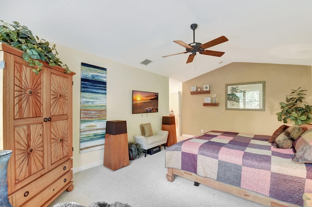 bedroom with ceiling fan, light carpet, and vaulted ceiling