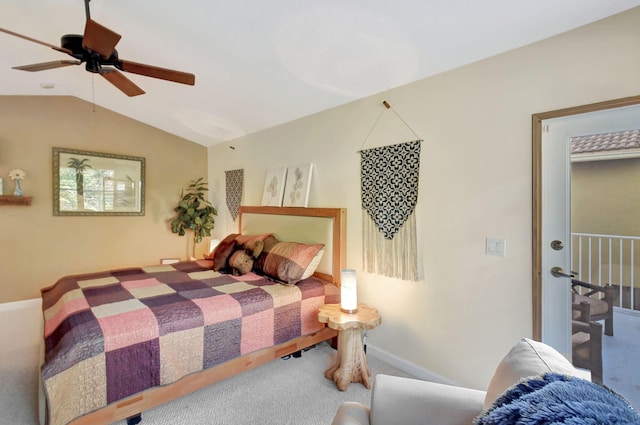 carpeted bedroom featuring ceiling fan and lofted ceiling