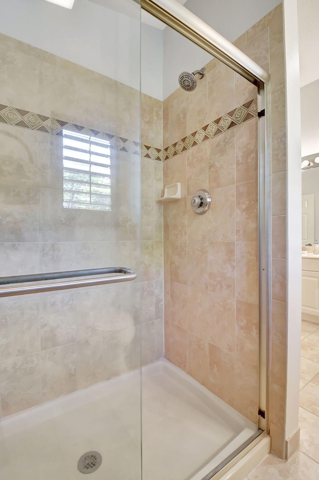 bathroom featuring an enclosed shower