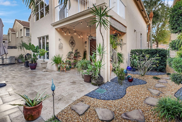 view of patio with a balcony