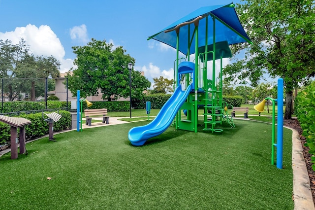 view of play area featuring a yard