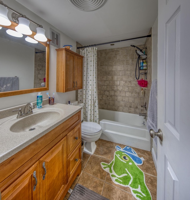 full bathroom featuring tile patterned floors, shower / bathtub combination with curtain, vanity, and toilet